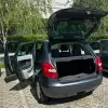 skoda_fabia_2010_outside_with_open_5_doors.webp